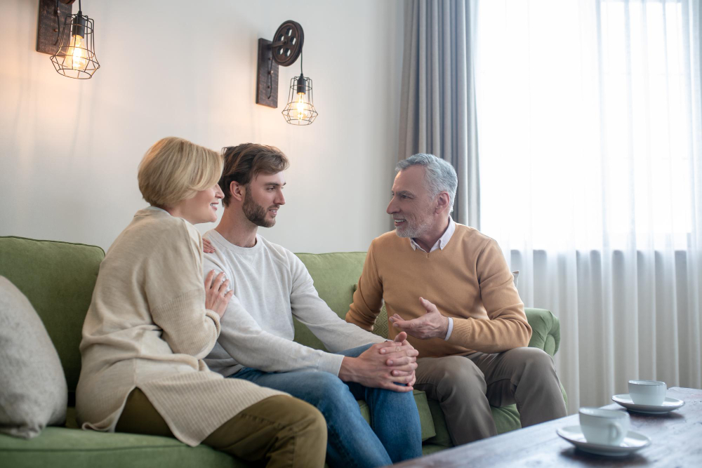Adult child caring for aging parent while prioritizing mental health, caregiver wellness, and family support.