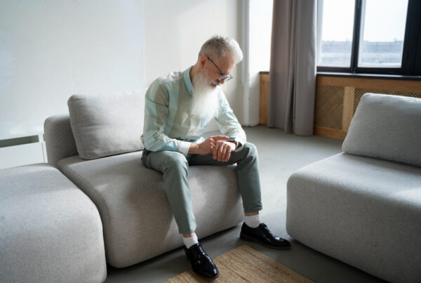 Older adult experiencing anxiety symptoms and excessive worry while receiving emotional support for improved senior mental health and well-being