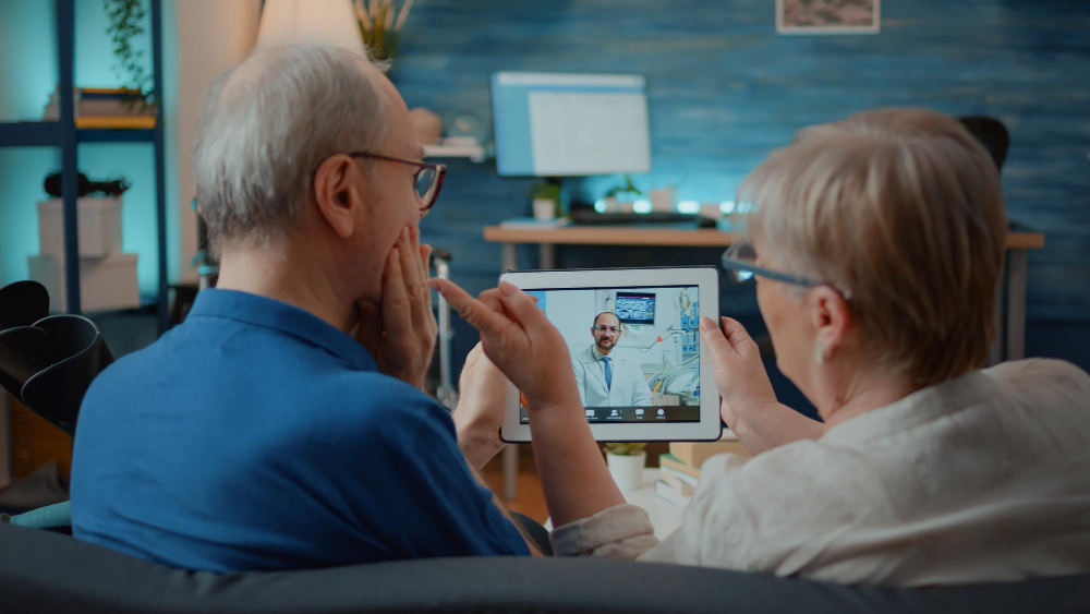 Mental health provider conducting a secure telehealth appointment with an adult patient.