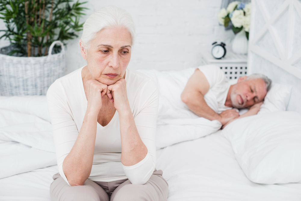 "Adult awake at 3 AM in bed experiencing sleep difficulties, anxiety, and nighttime awakening.